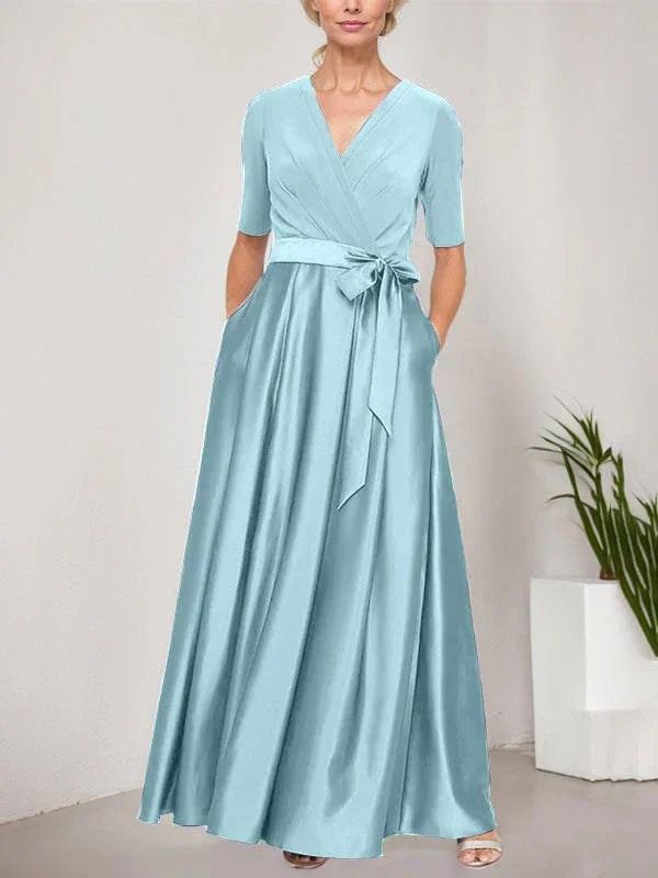 Vestido de baile con escote cruzado, falda completa de satén y cuerpo de jersey