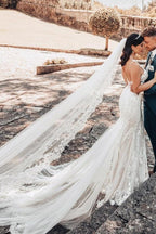 Vestido de novia de tul con escote en V, sin mangas y largo hasta el suelo, con encaje