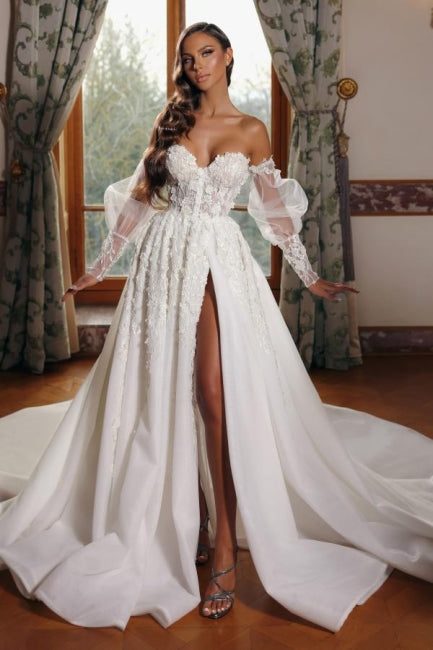 Vestido de novia princesa con escote corazón, mangas abullonadas y cuello alto