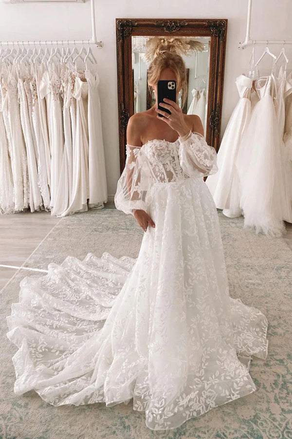 Vestido de novia de encaje con escote corazón y mangas abullonadas desmontables