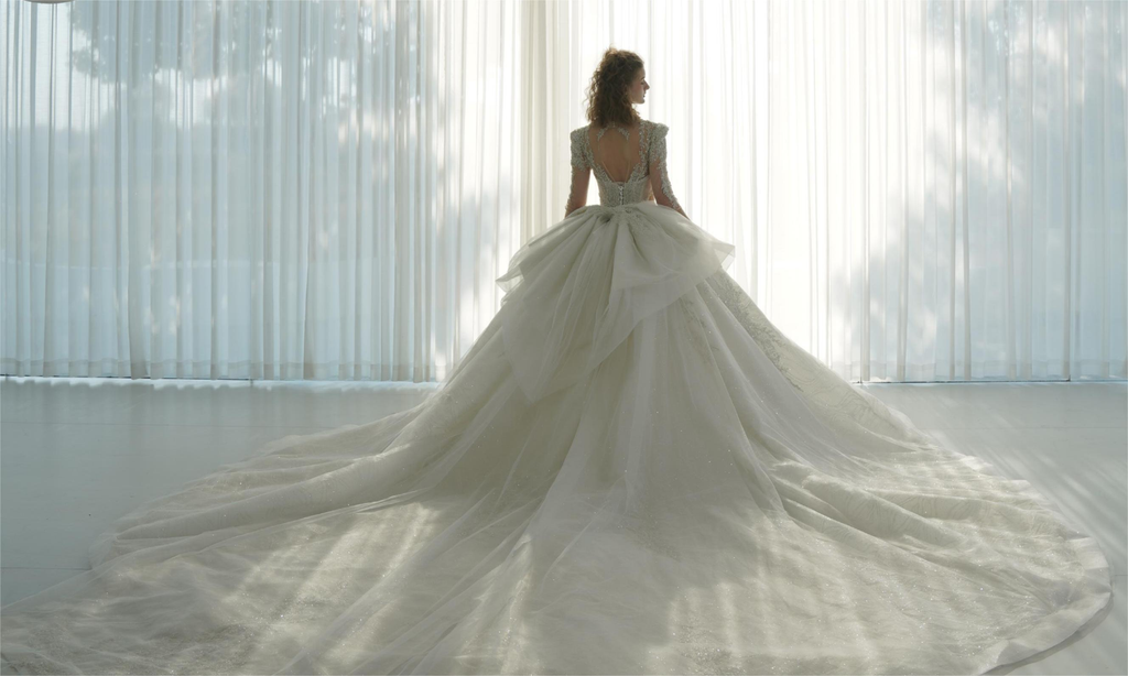 Luxe V-Neck Crystal Ball Gown Wedding Dress with Long Lace Sleeves & Oversized Bow