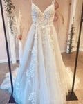 Elegant A Line Floor Length Wedding Dress With Spaghetti Straps Lace Appliques