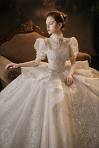 Luxury Puff Sleeve Ball Gown Wedding Dress with Corset Back & Beaded Lace