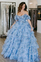Sigourney | Vestido largo de gala azul con flores, corte en línea A y volantes en capas