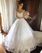 Charming Princess Tulle Wedding Dress With Long Sleeves And Appliques