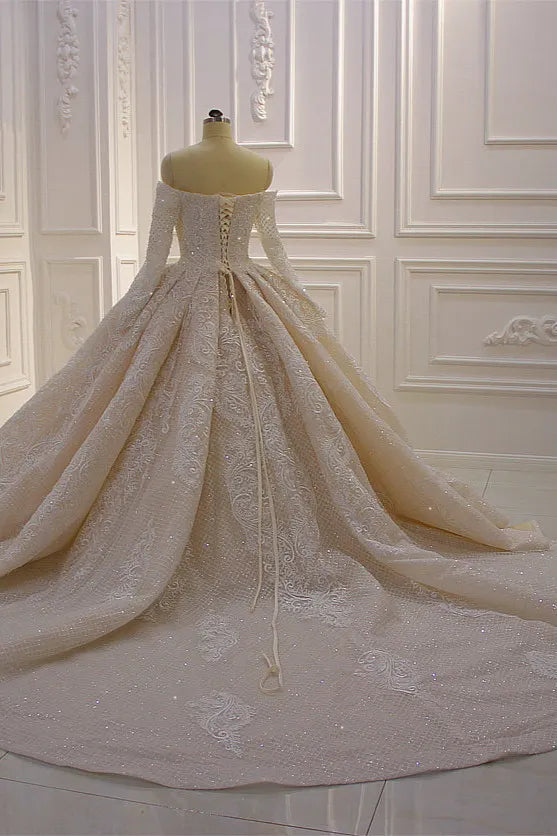 Stunning Ball Gown Wedding Dress With Off The Shoulder Sleeves And Lace Applique
