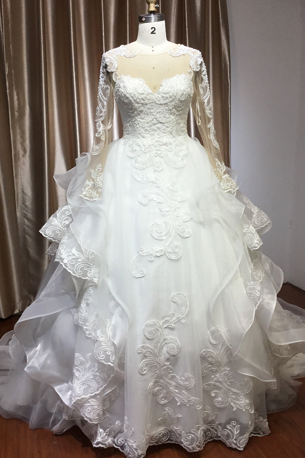 Chic Ruffled Ball Gown Long Sleeve Wedding Dress With Lace Appliques
