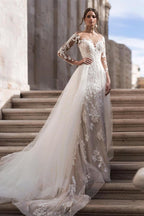 Abito da sposa elegante a linea ad A con maniche lunghe in pizzo e strascico staccabile