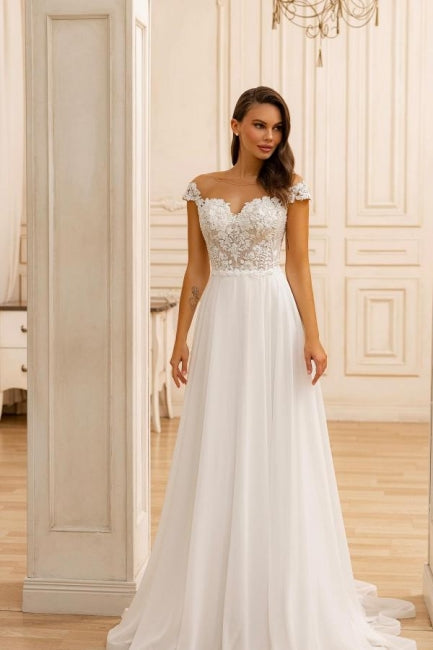 Elegante abito da sposa bianco senza maniche a linea ad A con scollo a cuore, pizzo, applicazioni e balze
