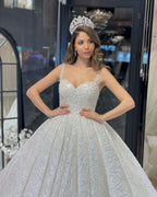 Robe de mariée élégante longue jusqu'au sol, sans manches, en forme de cœur, ligne A, ornée de paillettes avec volants