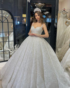 Robe de mariée élégante longue jusqu'au sol, sans manches, en forme de cœur, ligne A, ornée de paillettes avec volants