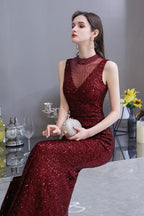 Abito da sera sirena senza maniche color borgogna con scollo a illusione elegante