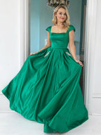 Robes de bal de fin d'études élégantes longues en satin, coupe en A, manches courtes en forme de coiffe, avec poches