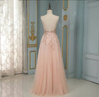 Robe de bal élégante longue en tulle à paillettes, dos nu, en ligne A avec décolleté en V