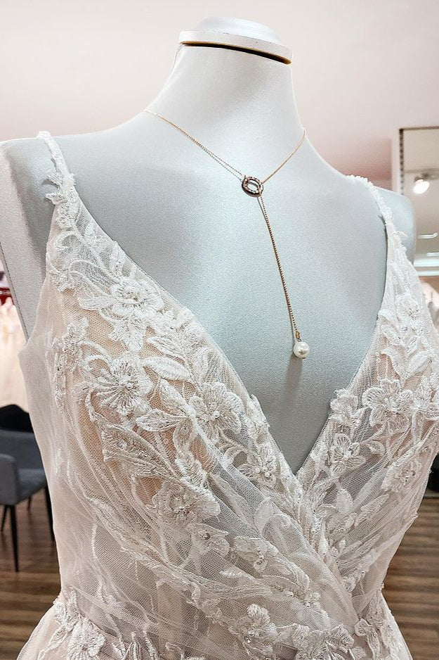 Elegante vestido de novia largo en forma de A con escote en V, sin mangas, con volantes y espalda descubierta