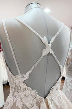 Elegante vestido de novia largo en forma de A con escote en V, sin mangas, con volantes y espalda descubierta