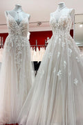 Elegante vestido de novia largo en forma de A con escote en V, sin mangas, con volantes y espalda descubierta