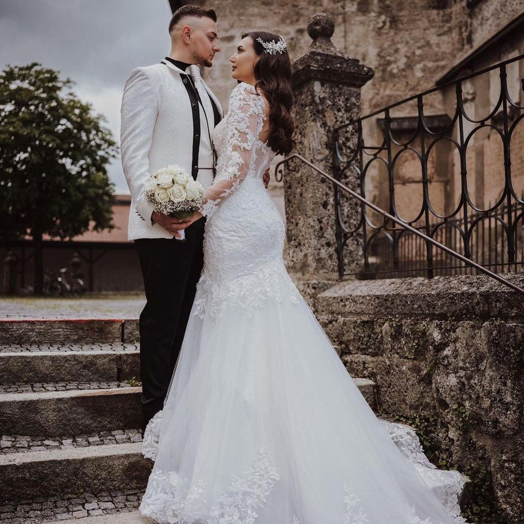 Elegante vestido de novia largo de sirena con encaje y espalda abierta con mangas