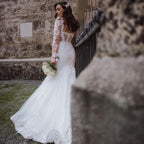 Elegante vestido de novia largo de sirena con encaje y espalda abierta con mangas