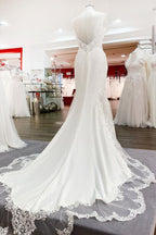 Abito da sposa elegante lungo a sirena con spalline sottili, pizzo, raso e schiena scoperta