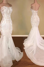 Robe de mariée longue élégante sirène à décolleté cœur ornée de paillettes