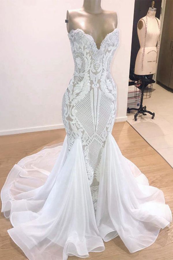 Robe de mariée longue élégante sirène à décolleté cœur ornée de paillettes