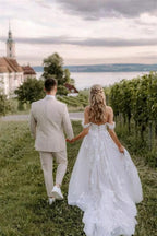 Robe de mariée élégante longue asymétrique en tulle avec dentelle florale