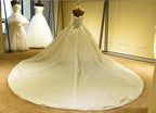Vestido de Noiva Elegante com Mangas Compridas, Decote Coração, Cordão de Renda e Saia de Tule Marfim