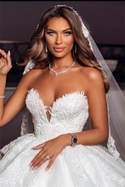 Robe de mariée élégante princesse en ligne A sans manches avec appliques et dos nu