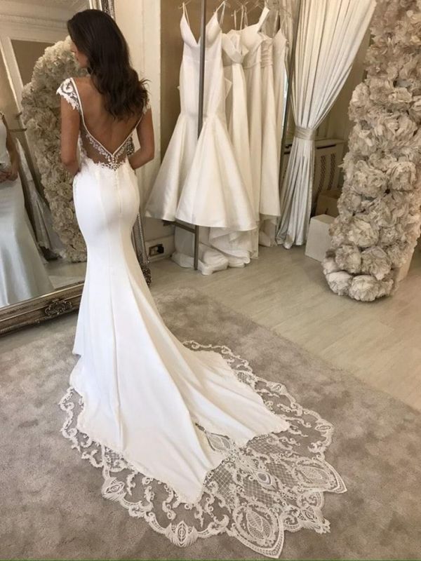 Elegantes vestidos de novia de sirena con encaje marfil y satén sin mangas 
