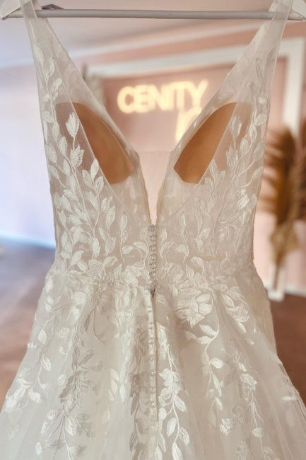Elegante vestido de novia de encaje, corte A, sin mangas y escote en V