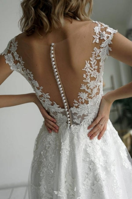 Elegantes vestidos de novia de corte A sin mangas con escote en V y encaje