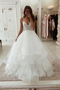 Elegantes weißes ärmelloses A-Linien-Brautkleid mit V-Ausschnitt und Spitze
