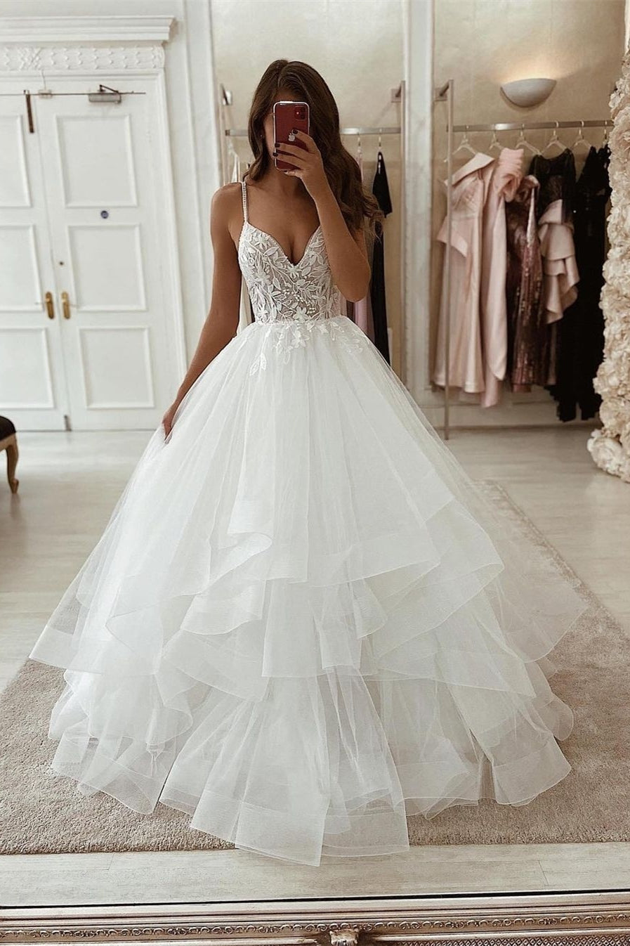Elegantes weißes ärmelloses A-Linien-Brautkleid mit V-Ausschnitt und Spitze