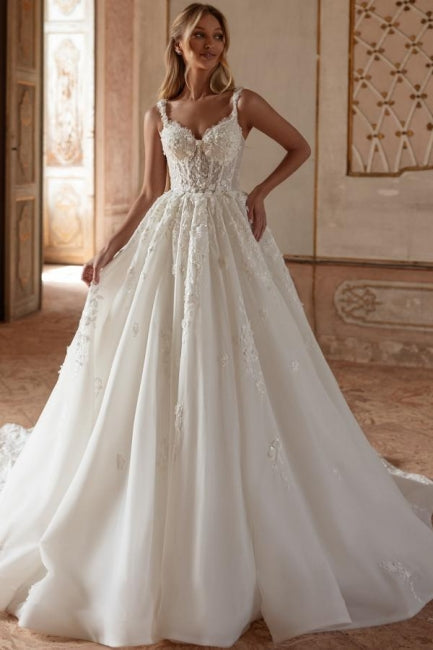 Abito da sposa principesco lungo avorio a linea ad A con spalline sottili, pizzo e tulle