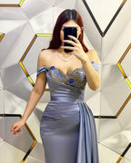 Robe de bal longue sirène à paillettes, décolletée épaules nues, avec volants