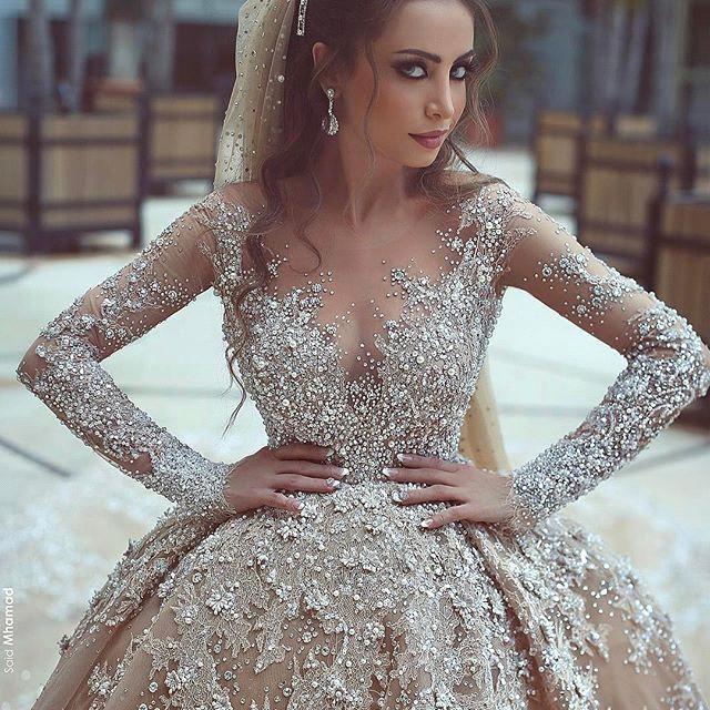 Long Sleeves Beaded Ball Gown Wedding Dress With Appliques