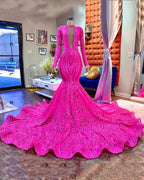 Robe de bal longue sirène fuchsia à décolleté plongeant en V, ornée de sequins, avec manches