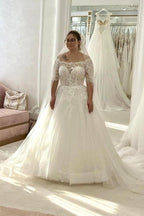 Ivory Off The Shoulder A Line Wedding Dress With Appliques And Chapel Train