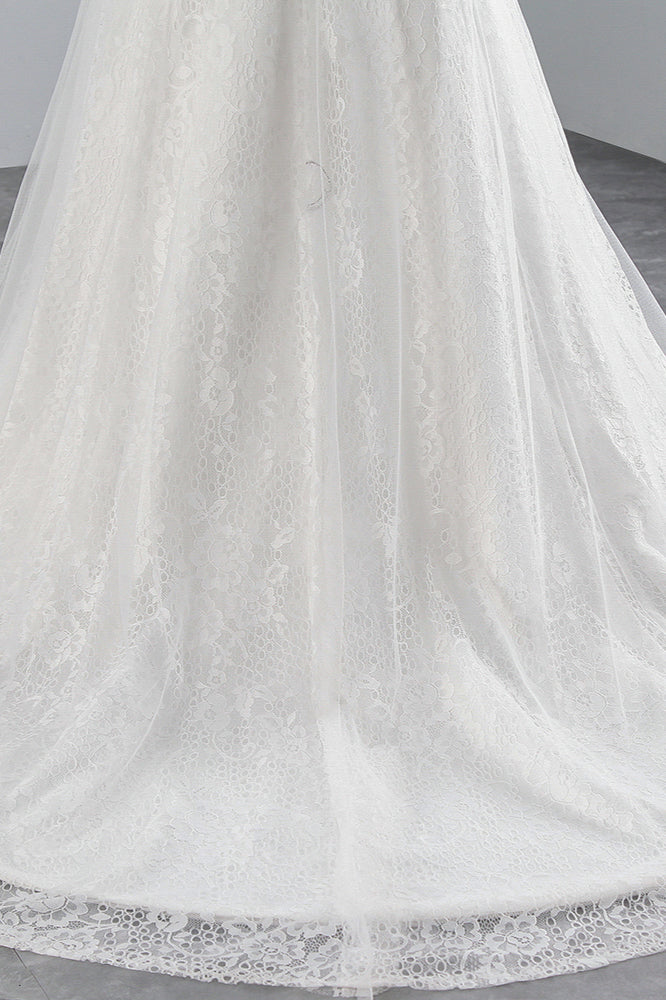 Abito da sposa lungo a sirena con pizzi e applicazioni in tulle scintillanti