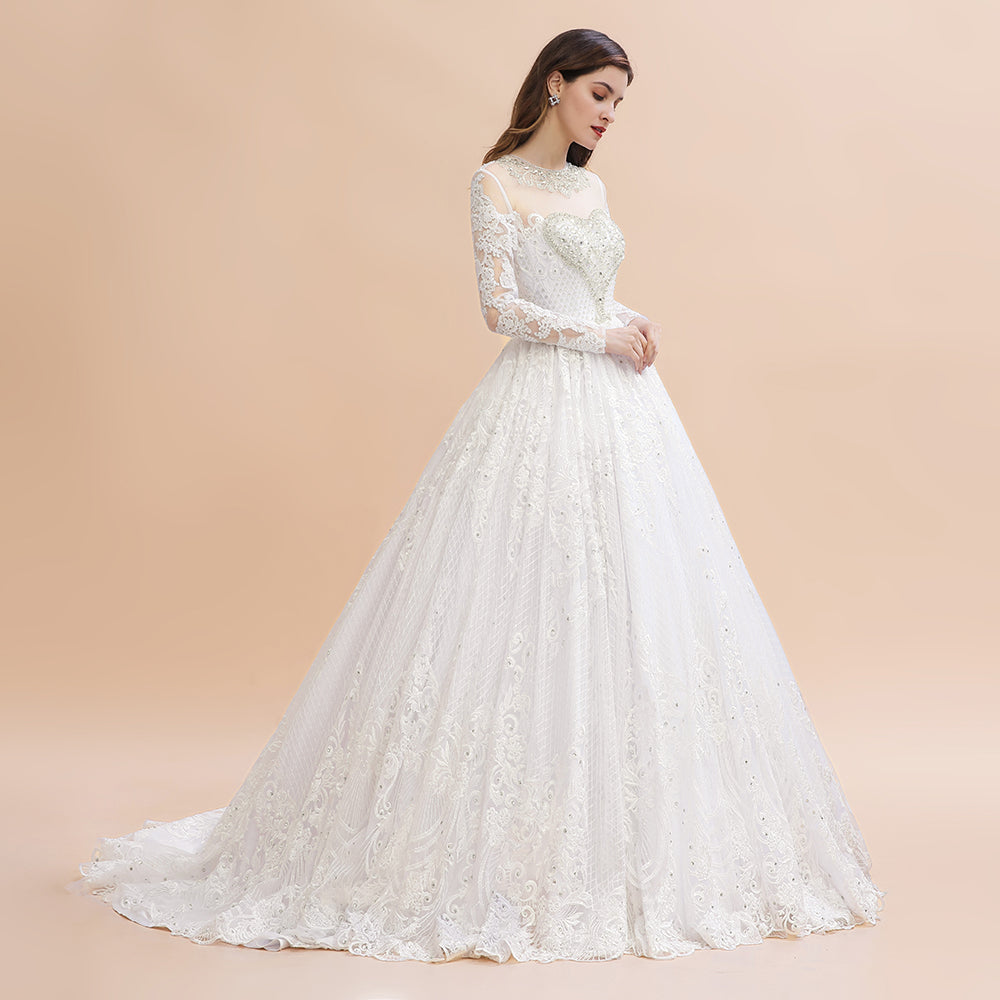 Robe de mariée blanche/crème en dentelle avec appliques perlées à manches longues et style élégant