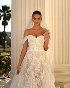 Glamoroso vestido de novia blanco largo de encaje con corte en A y hombros descubiertos