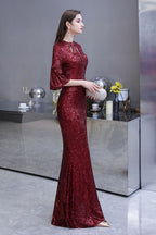 Robe de fête sirène bordeaux à paillettes, manches mi-longues et ouverture en trou de serrure