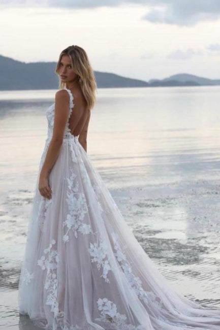 Hermosos vestidos de novia blancos sin mangas con escote en A y encaje con apliques en la cola