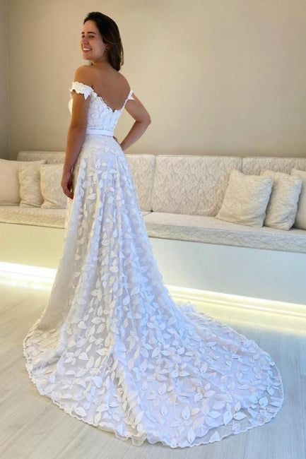 Splendidi abiti da sposa bianchi senza maniche con scollo a cuore, linea a trapezio, pizzo e applicazioni, schiena scoperta