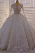 Magnifique robe de mariée blanche en ligne A, col en V, manches longues en dentelle ornée de paillettes