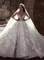Abito da sposa principesco con perline splendide, floreale, collo trasparente e maniche lunghe