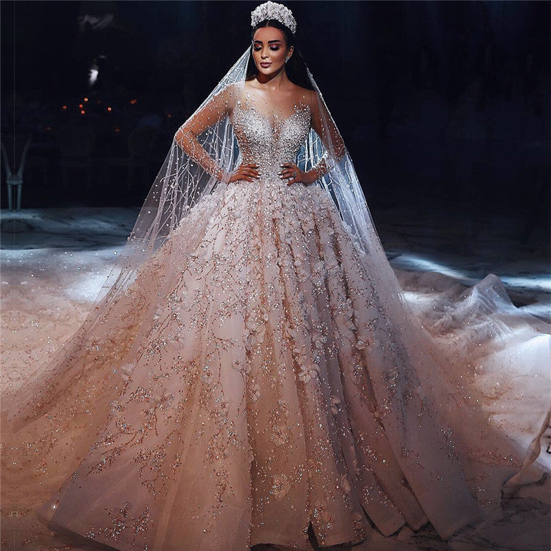 Abito da sposa principesco con perline splendide, floreale, collo trasparente e maniche lunghe