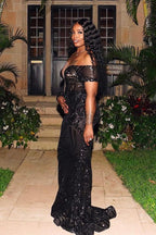 Hermoso vestido de fiesta negro largo de sirena con un solo hombro de tul y encaje con mangas
