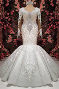 Robe de mariée sirène somptueuse ornée de cristaux, manches longues, traîne de chapelle